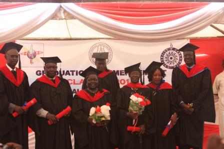 The seven SPLM graduates posing for pictures after receiving their credentials