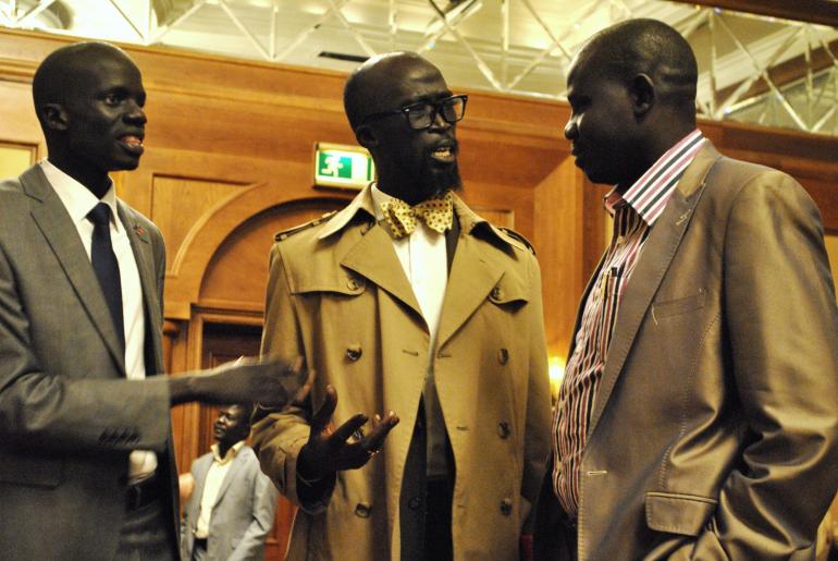 Mabior Garang, center, talks with other opposition delegates during a press conference in Addis Ababa, Ethiopia. Courtesy - of - www.ibtimes.com