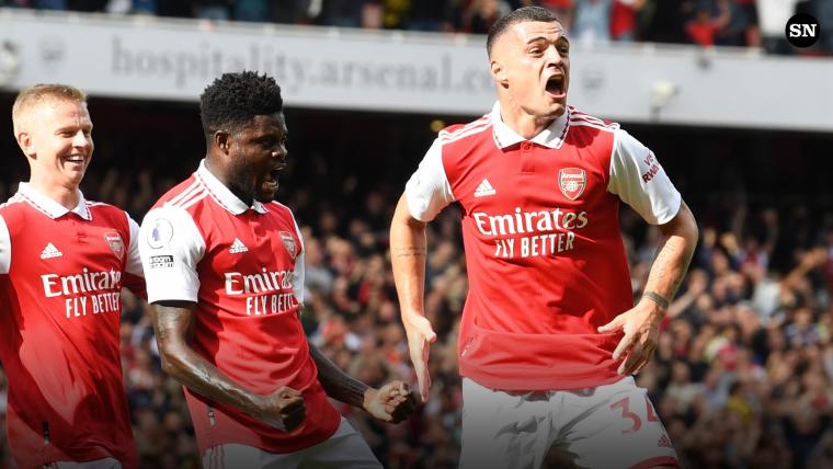 Brilliant Arsenal beat Spurs to cling to top