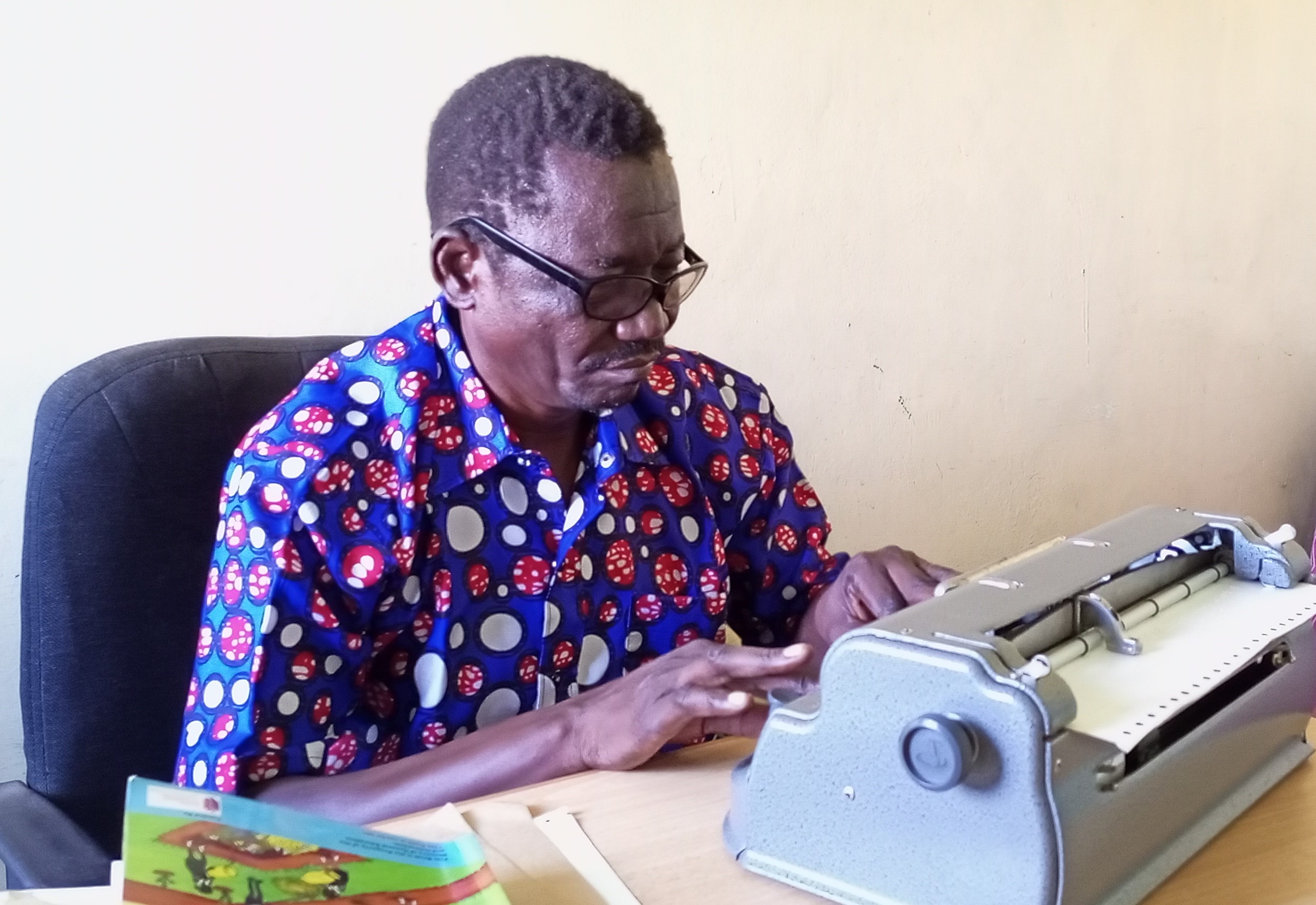 The visually impaired teachers transcribing textbooks into braille