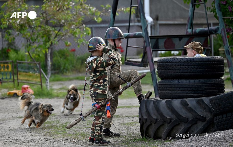 ‘Playing war’: Conflict militarises Ukraine children
